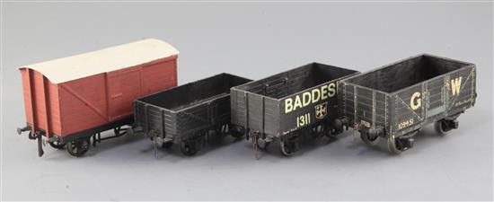 A red box van, a Bawdesley open wagon 12T, no.1311, in black, an open wagon, in black and a G.W. open wagon